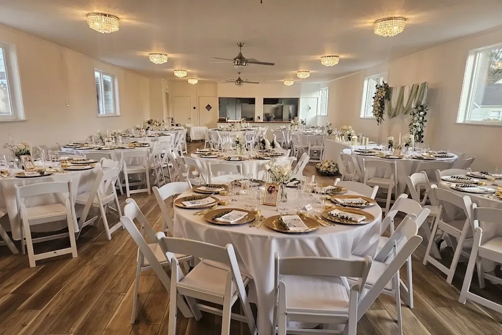 Madison Hill reception hall set with round tables and chairs for a wedding reception