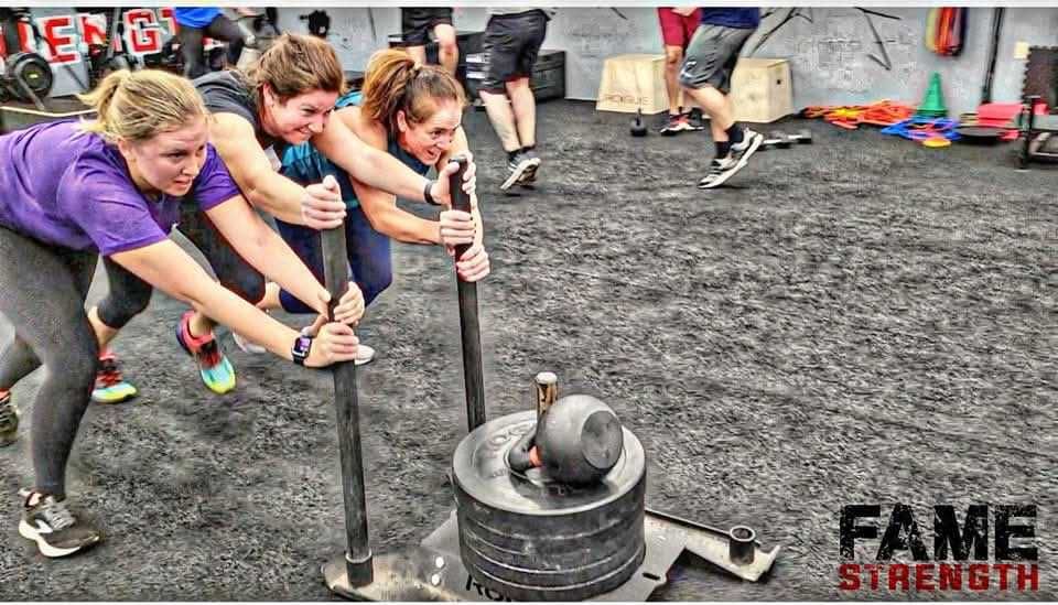 Athlete lifting during small-group session
