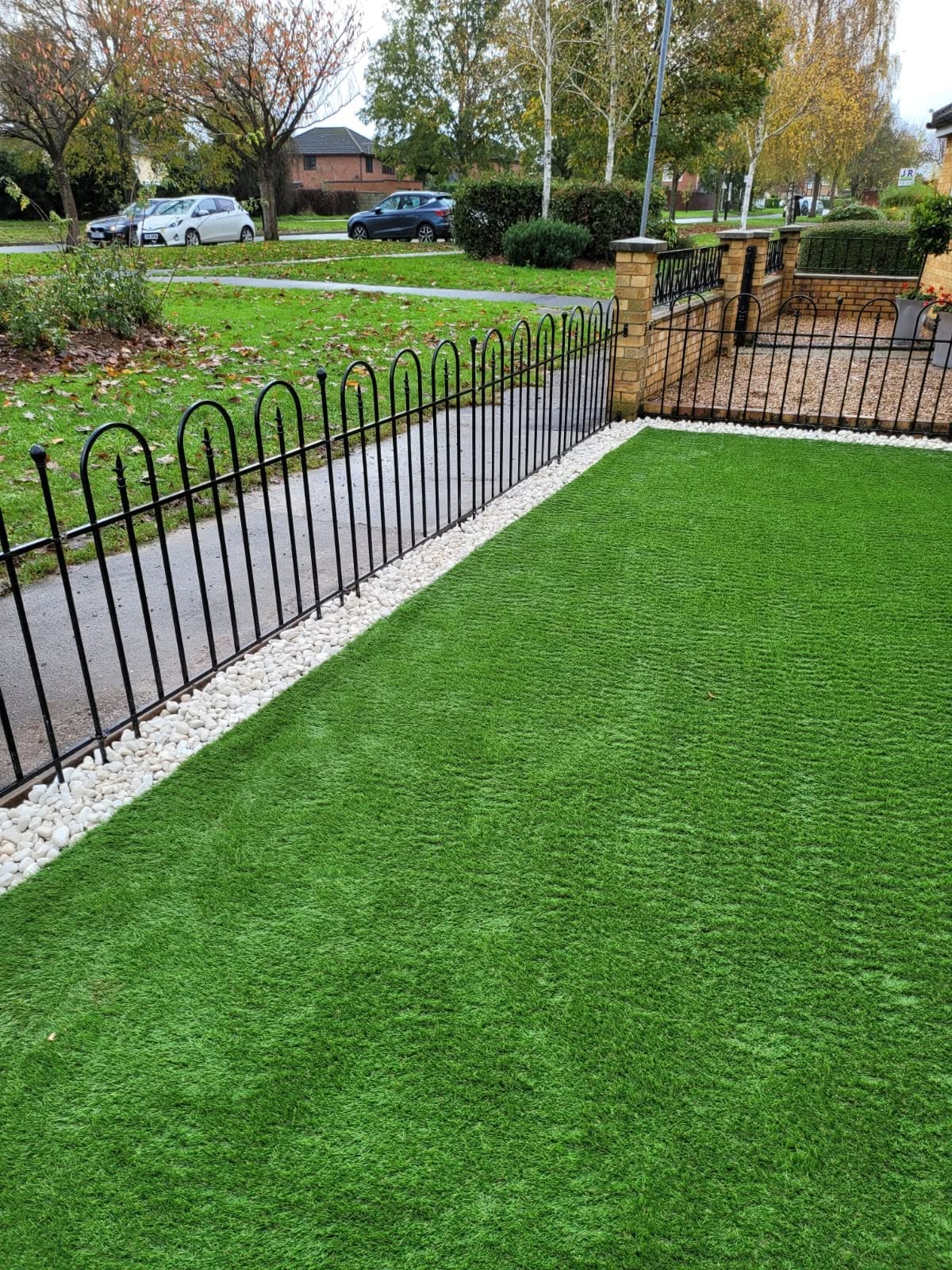 Perfectly trimmed tall green hedge