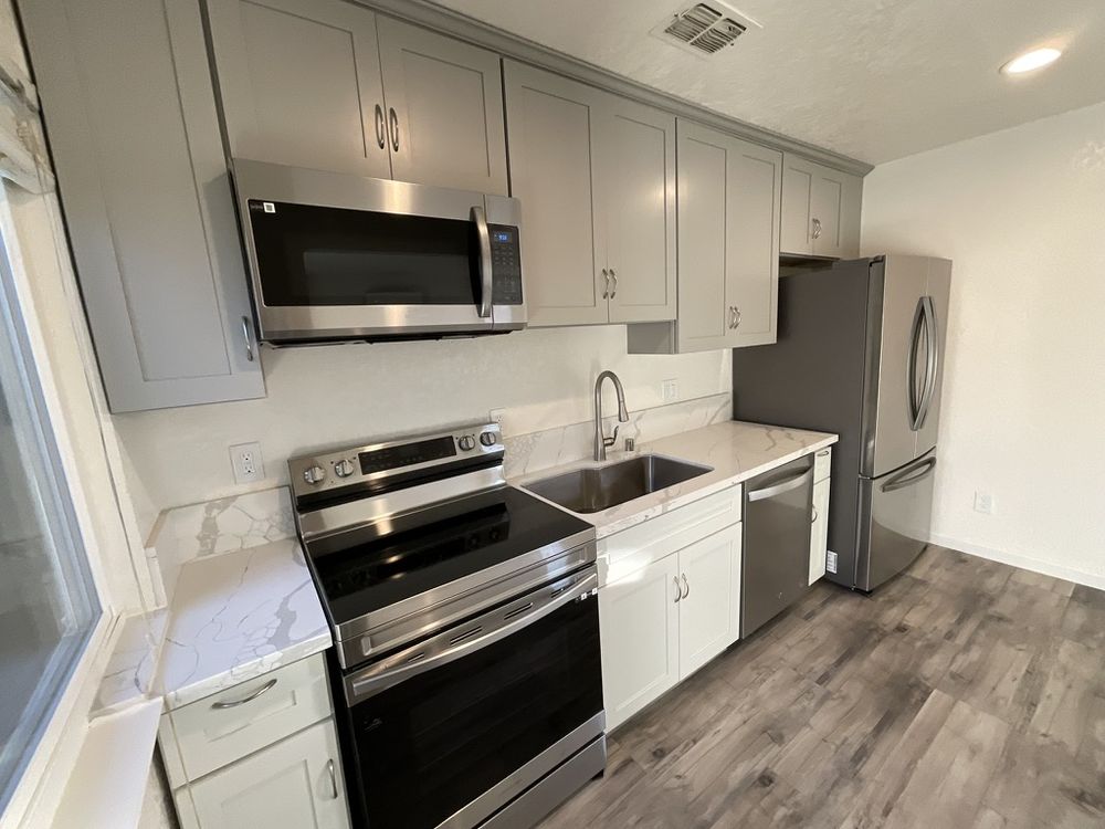 Homeowners with their newly built accessory dwelling unit