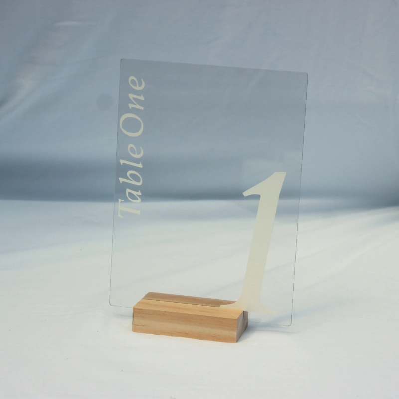 White table number signs with wooden holders for Bay of Islands wedding table decor