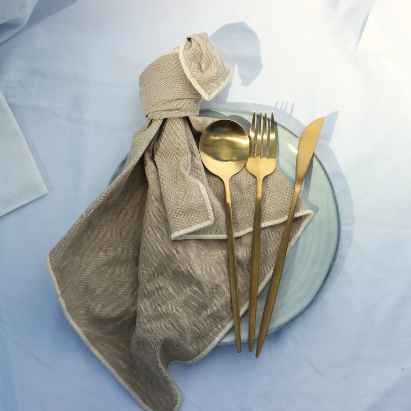 Gold cutlery set for elegant Bay of Islands wedding hire, perfect for formal receptions