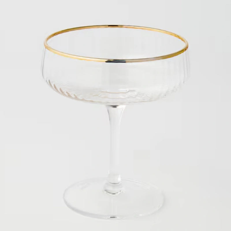 Gold Rimmed Champagne Glass for wedding and event hire Northland