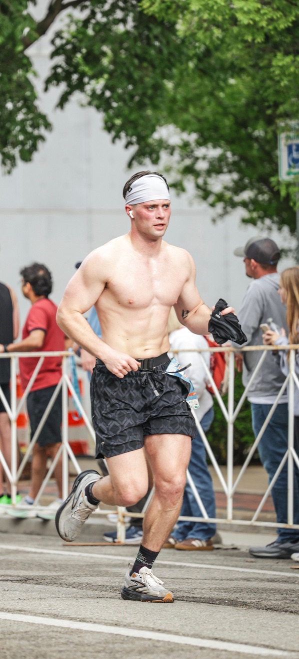 Gray mid-stride during a road race
