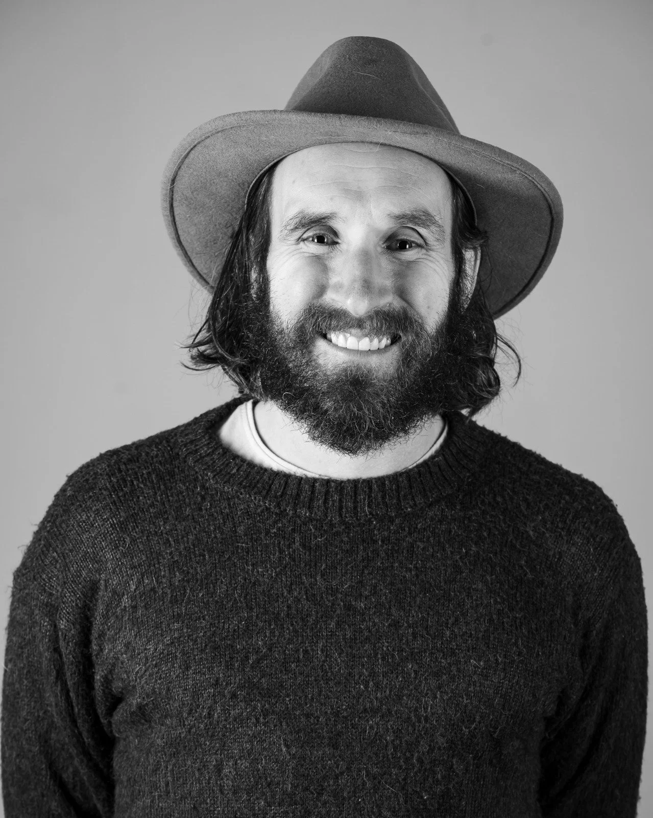 Portrait of Dr. Steve Kruzeniski wearing a felt hat