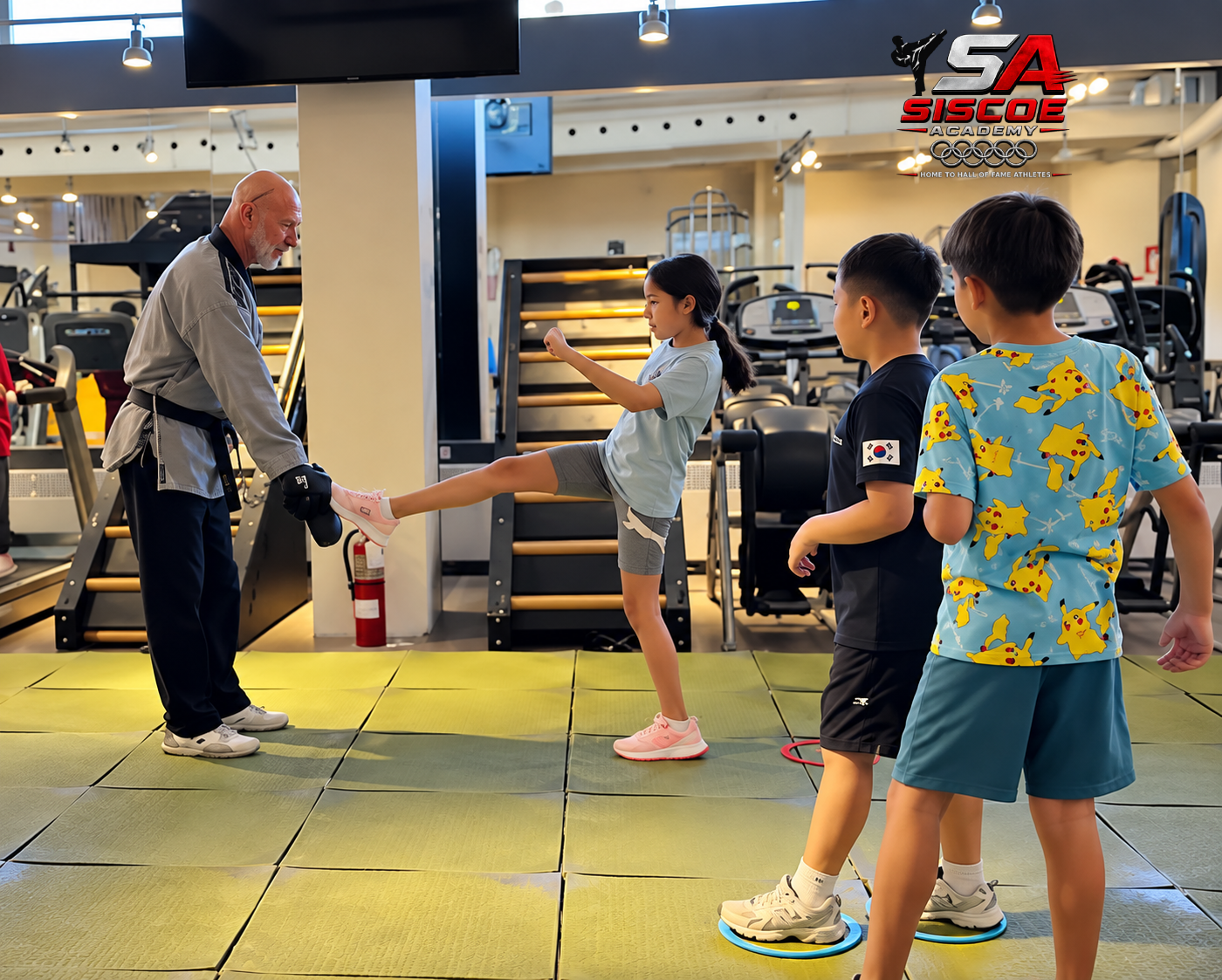 Grand Master Yves Simard teaching a children's Taekwondo class at SISCOE Academy