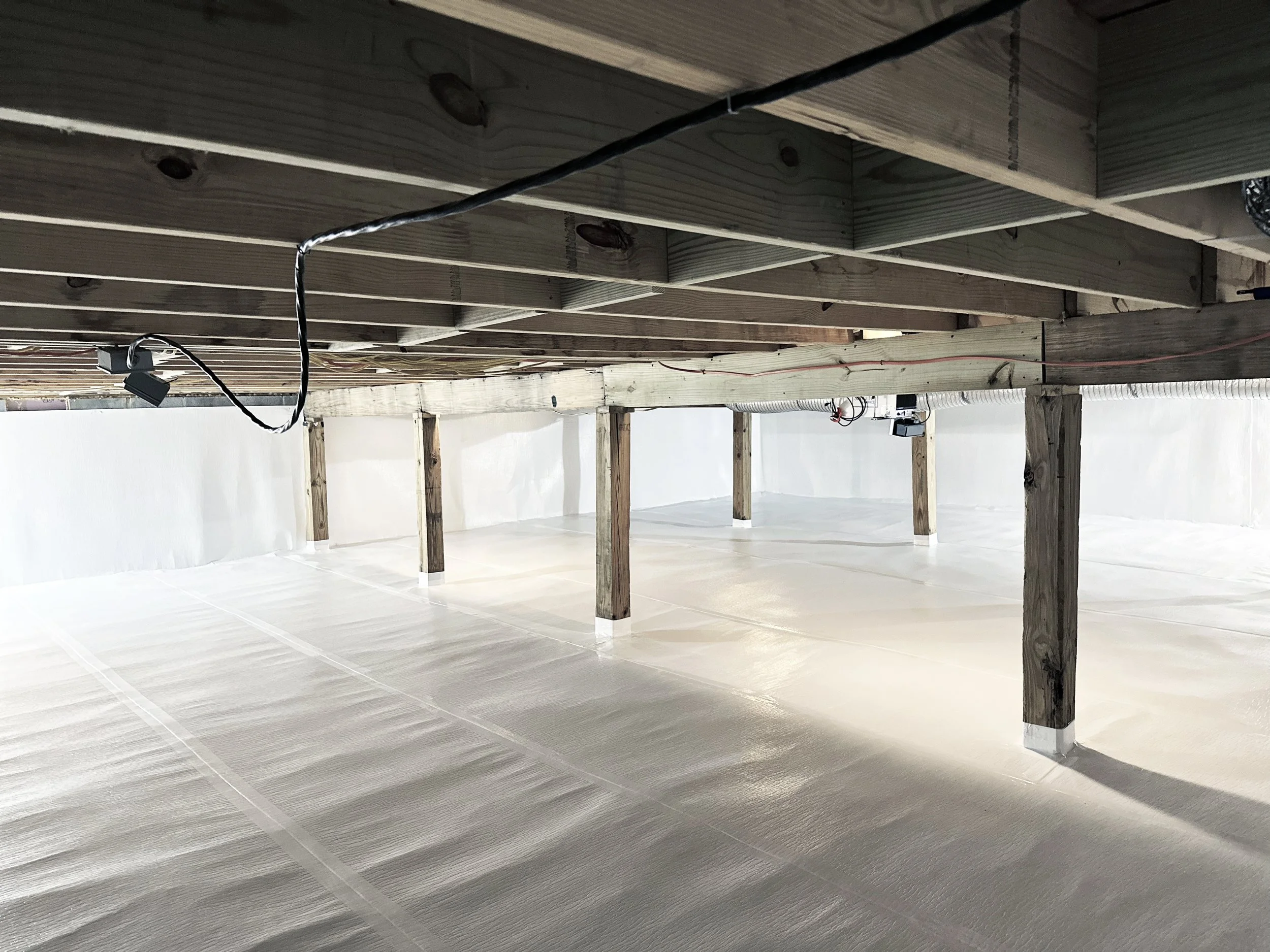 encapsulated crawl space with sealed vapor barrier preventing moisture buildup encapsulated crawl space with sealed vapor barrier preventing moisture buildup