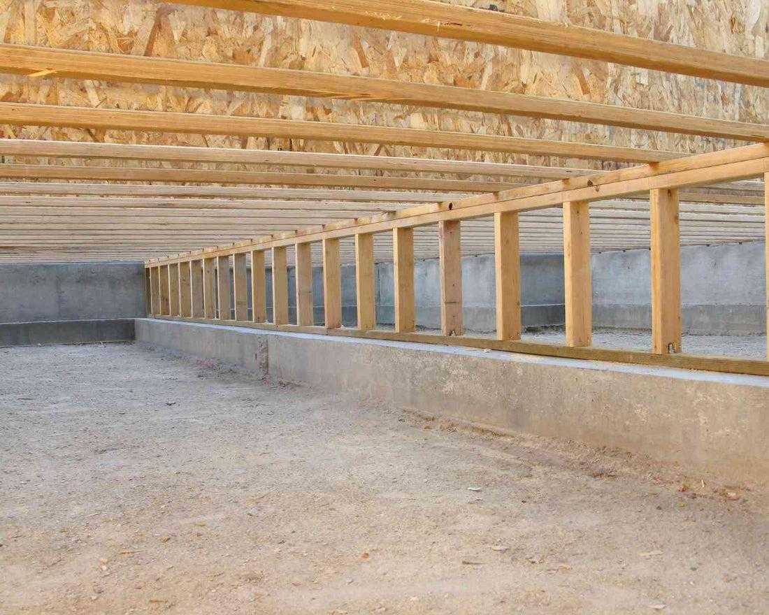Crawl space perimeter where soil conditions can differ from more open areas beneath the home.