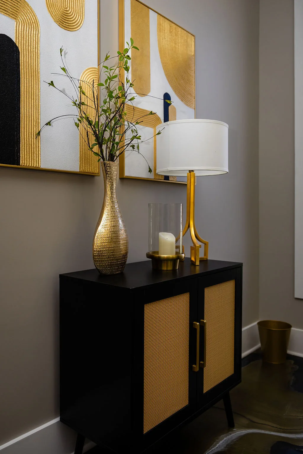 Gold vase, lamp and decor in the Lexel studio