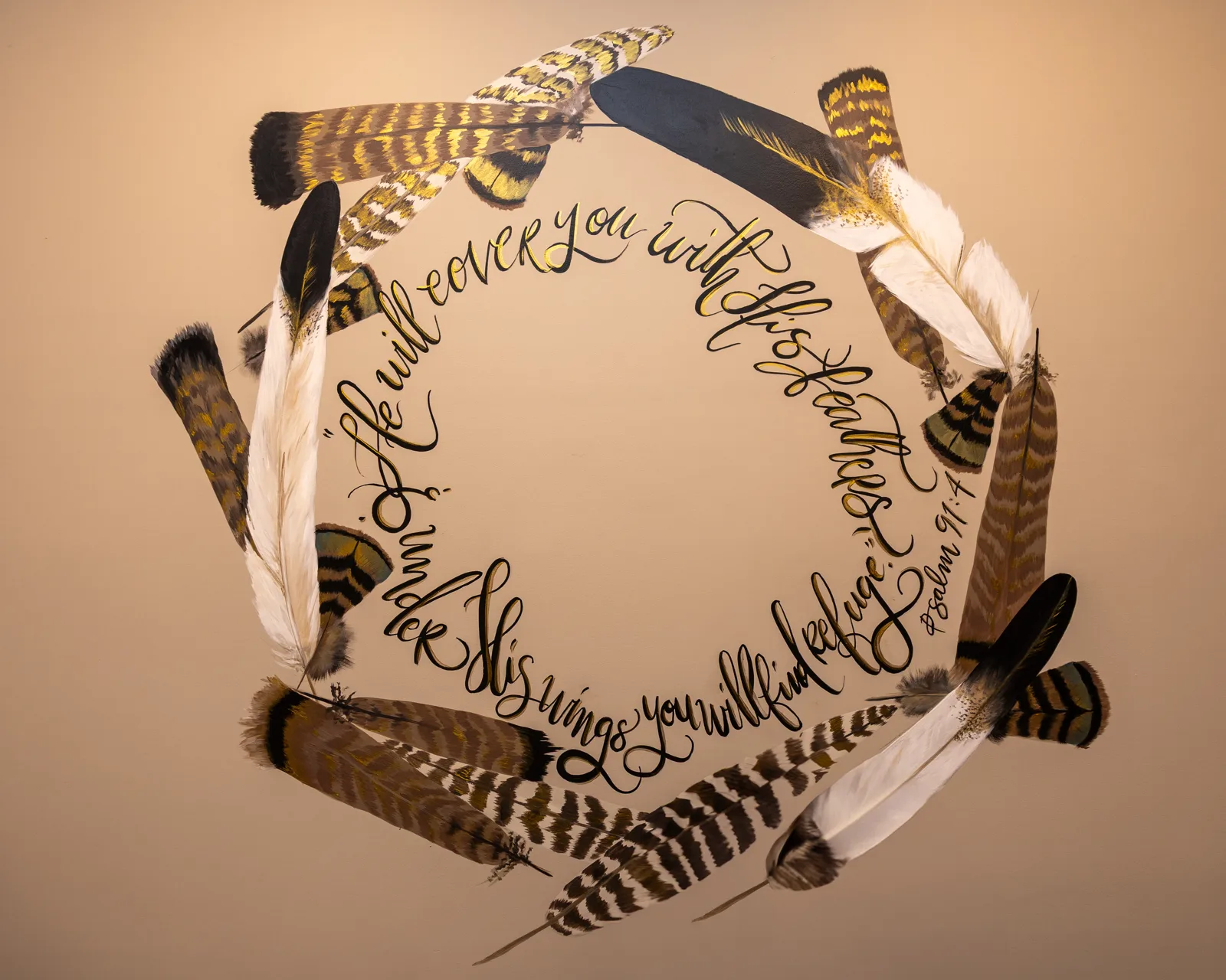 Hand-painted feather mural with Psalm 91:4 calligraphy at Lexel in Dunn, North Carolina