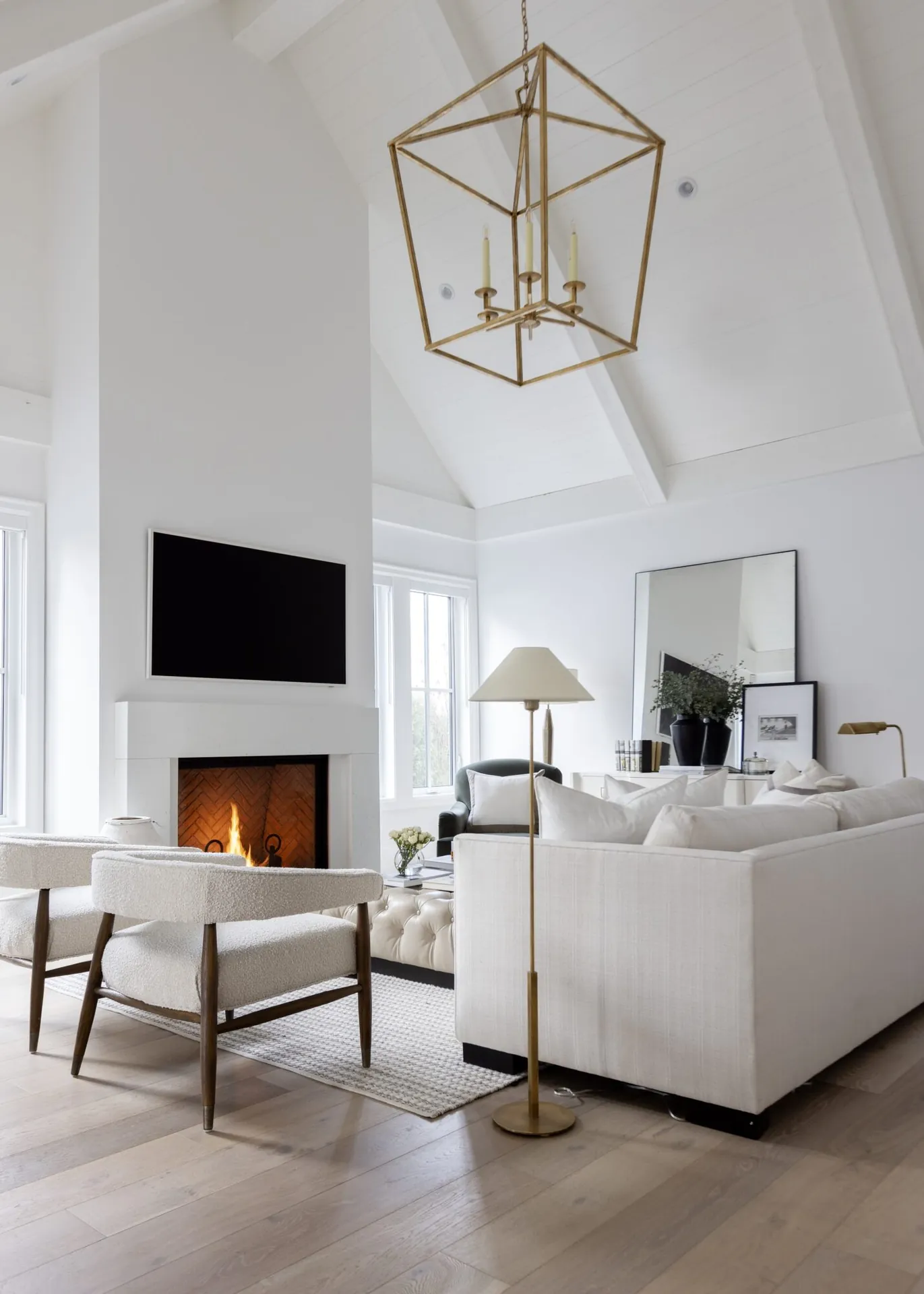 Vaulted living room with fireplace, interior painting in the Bartlett custom home, Langley