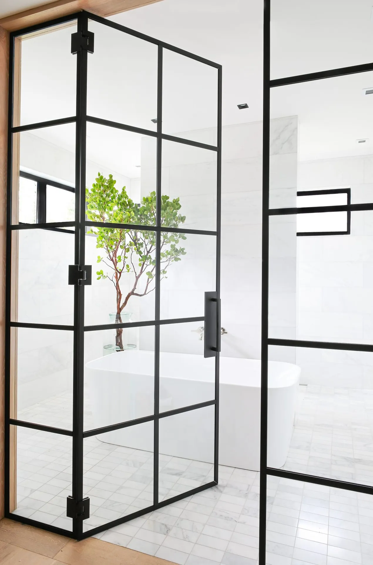 Ensuite with black steel shower, interior painting in the Ferme Moderne custom home
