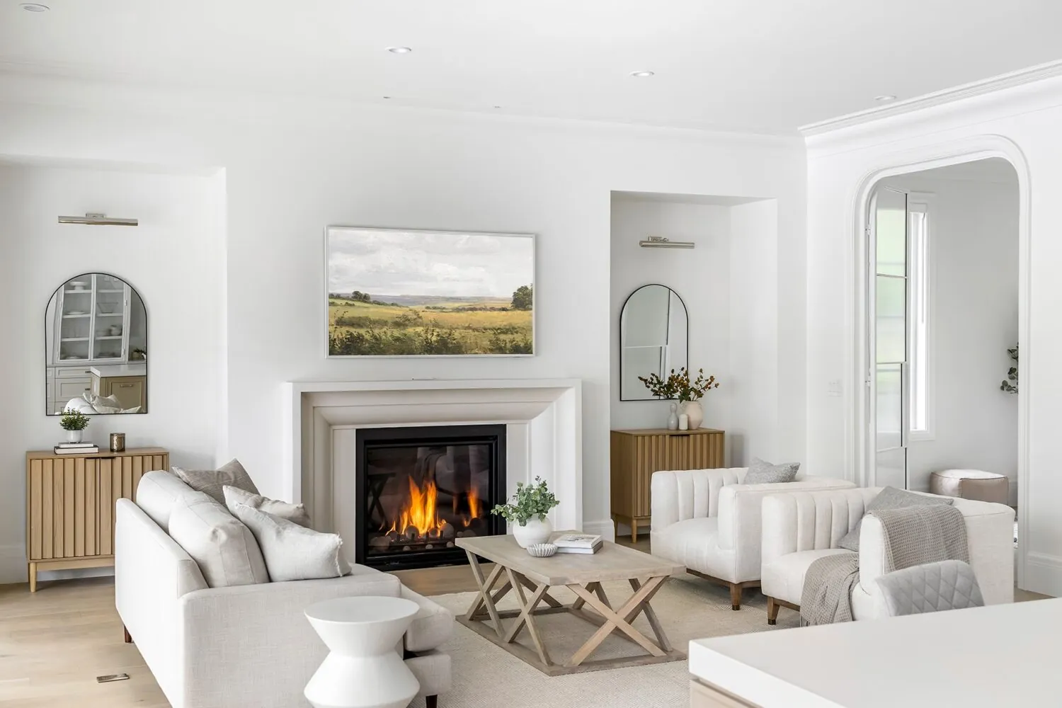 Living room with fireplace, interior painting in the Jeffrey custom home