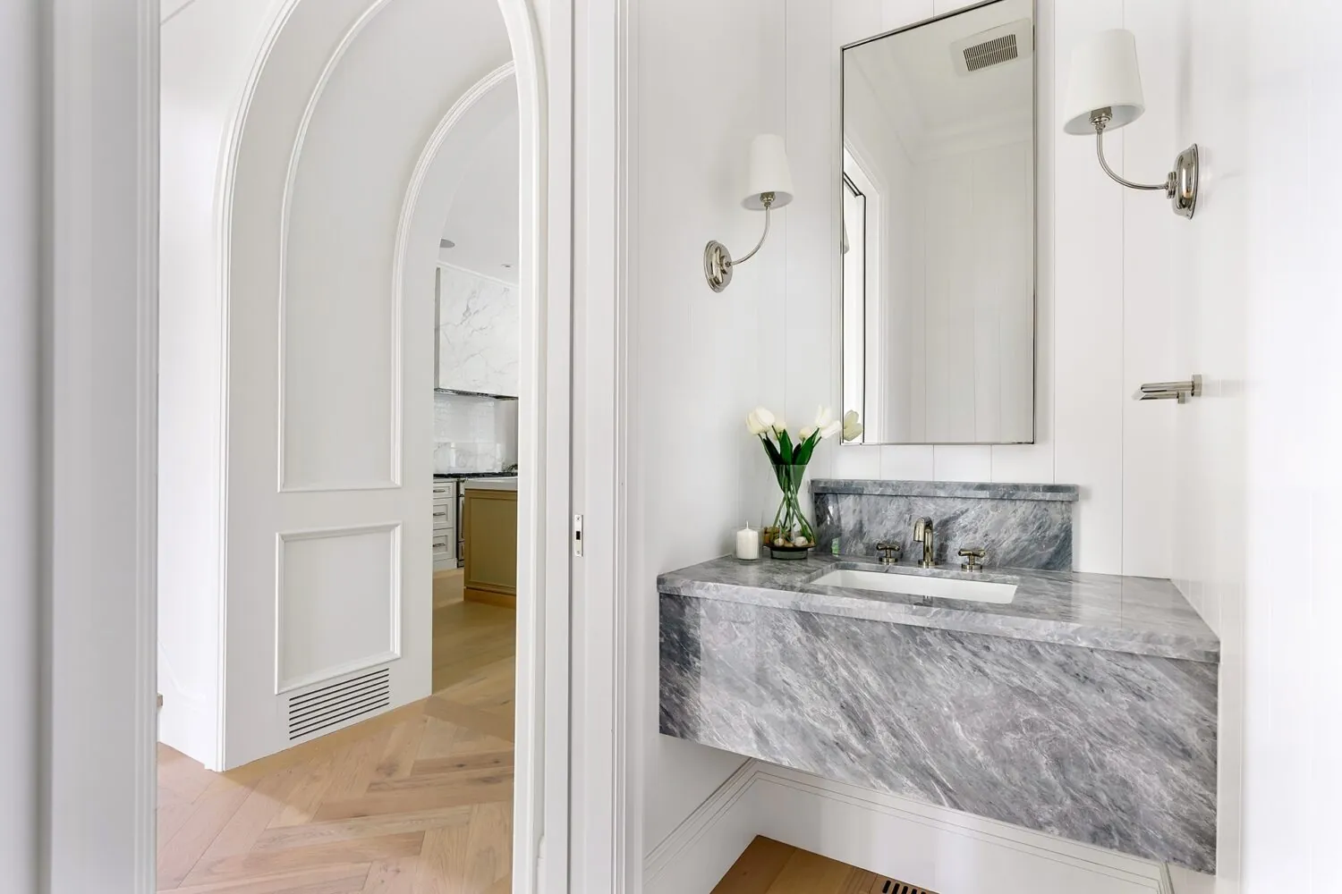 Arched powder room interior painting in the Jeffrey custom home