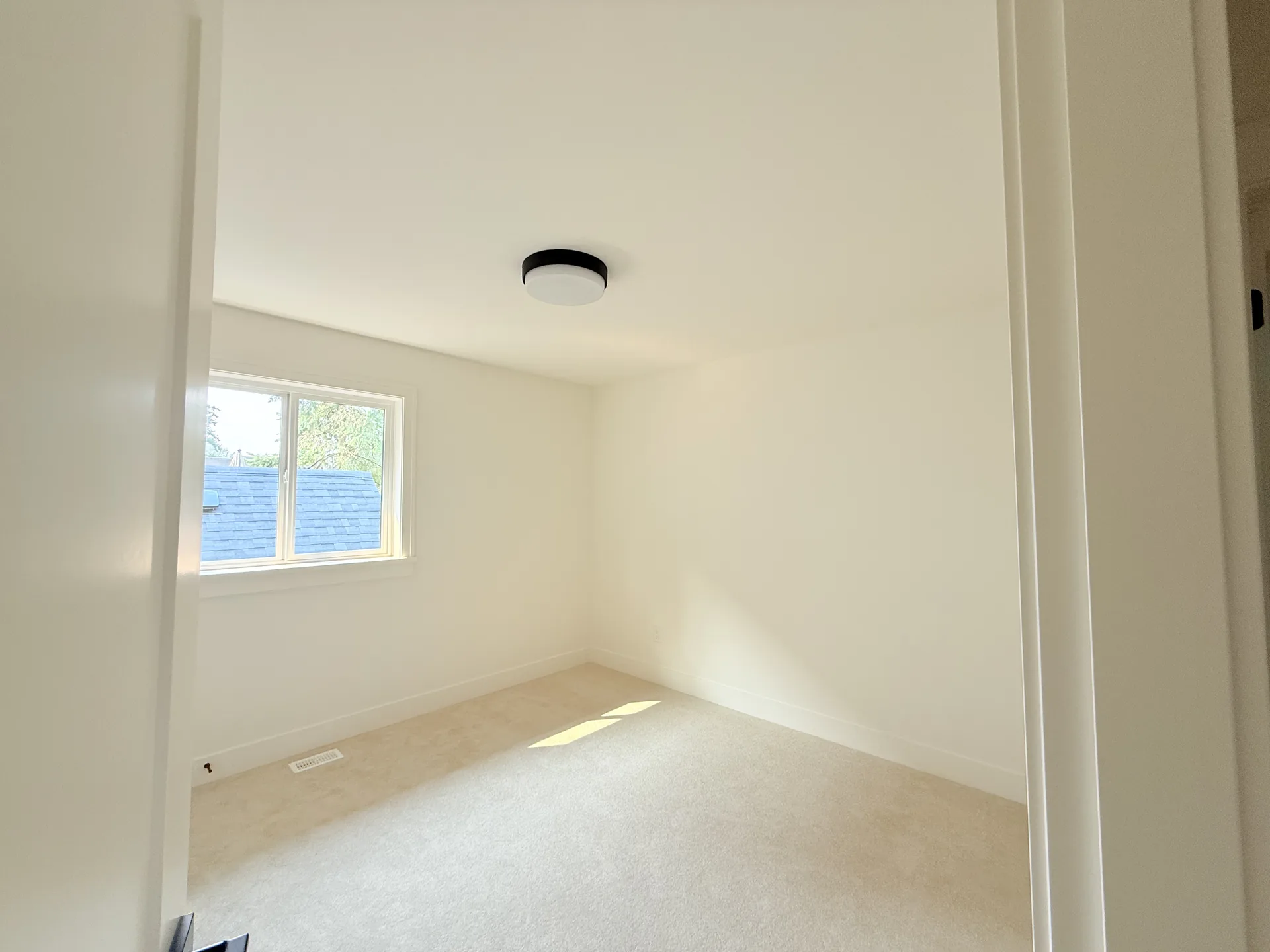Bedroom painted in soft white