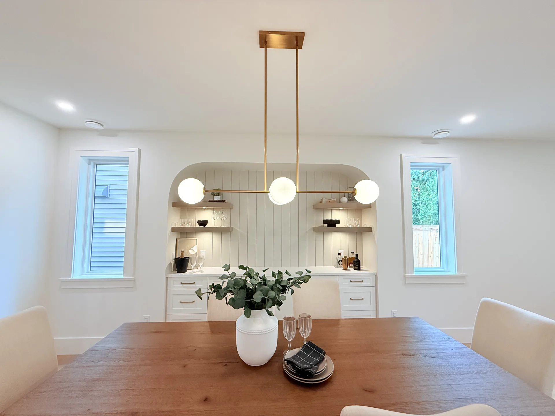 Dining room with arched built-in nook, interior painting