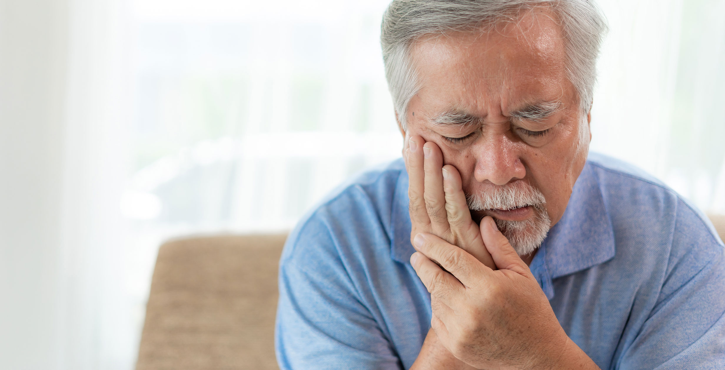 Woman with tooth pain