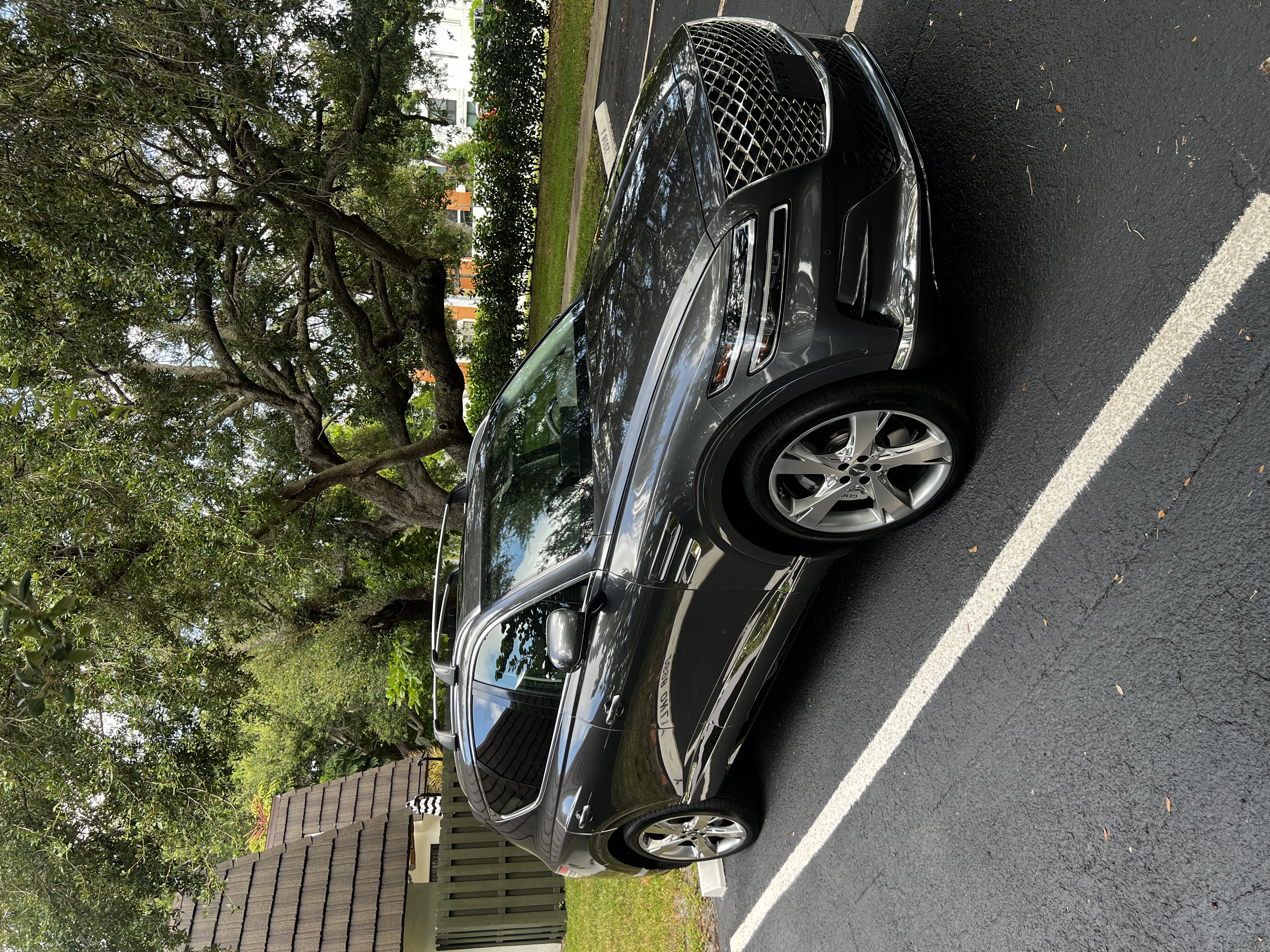 Deep gloss black exterior vehicle finish detailed by Palm Prestige