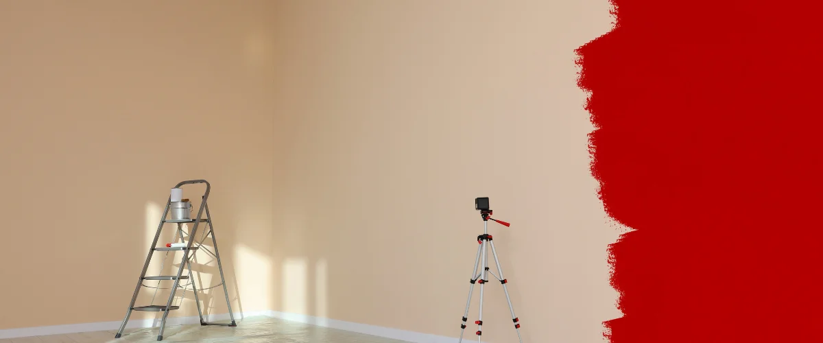 Ladder and camera tripod set up in a room prepared for painting with fresh beige walls. Ladder and camera tripod set up in a room prepared for painting with fresh beige walls.