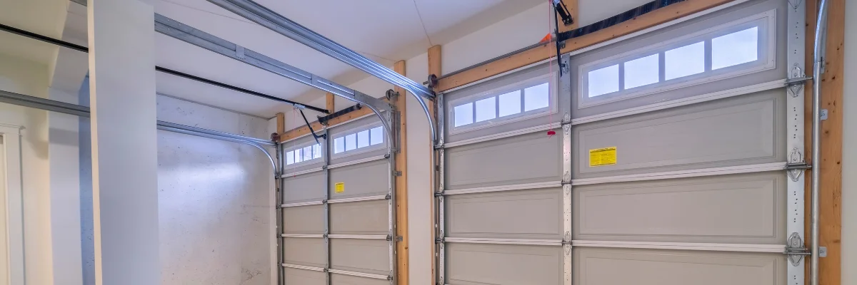 Interior view of double garage doors with overhead track system.