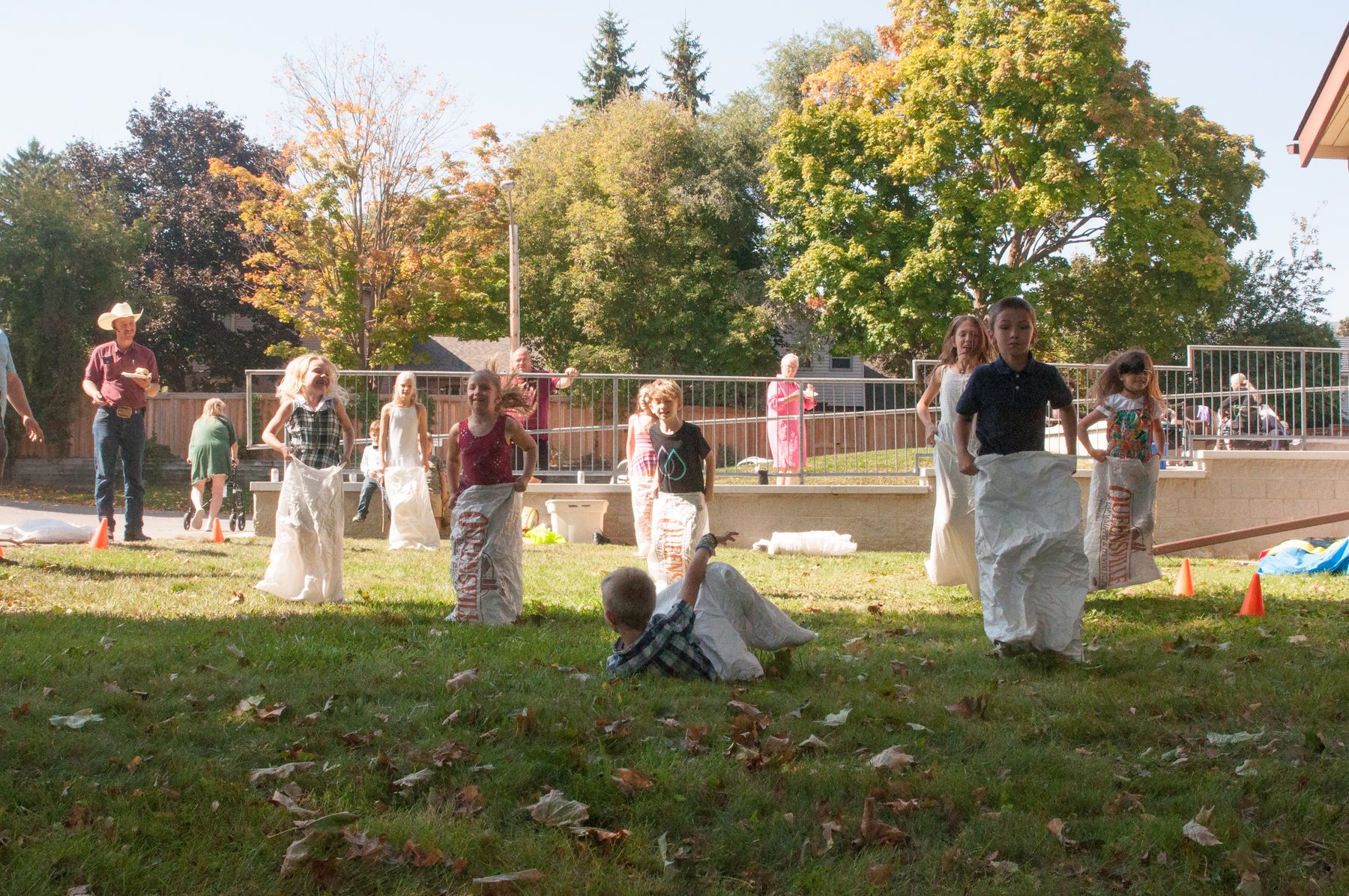 Sack races on the church lawn at the fall kick off