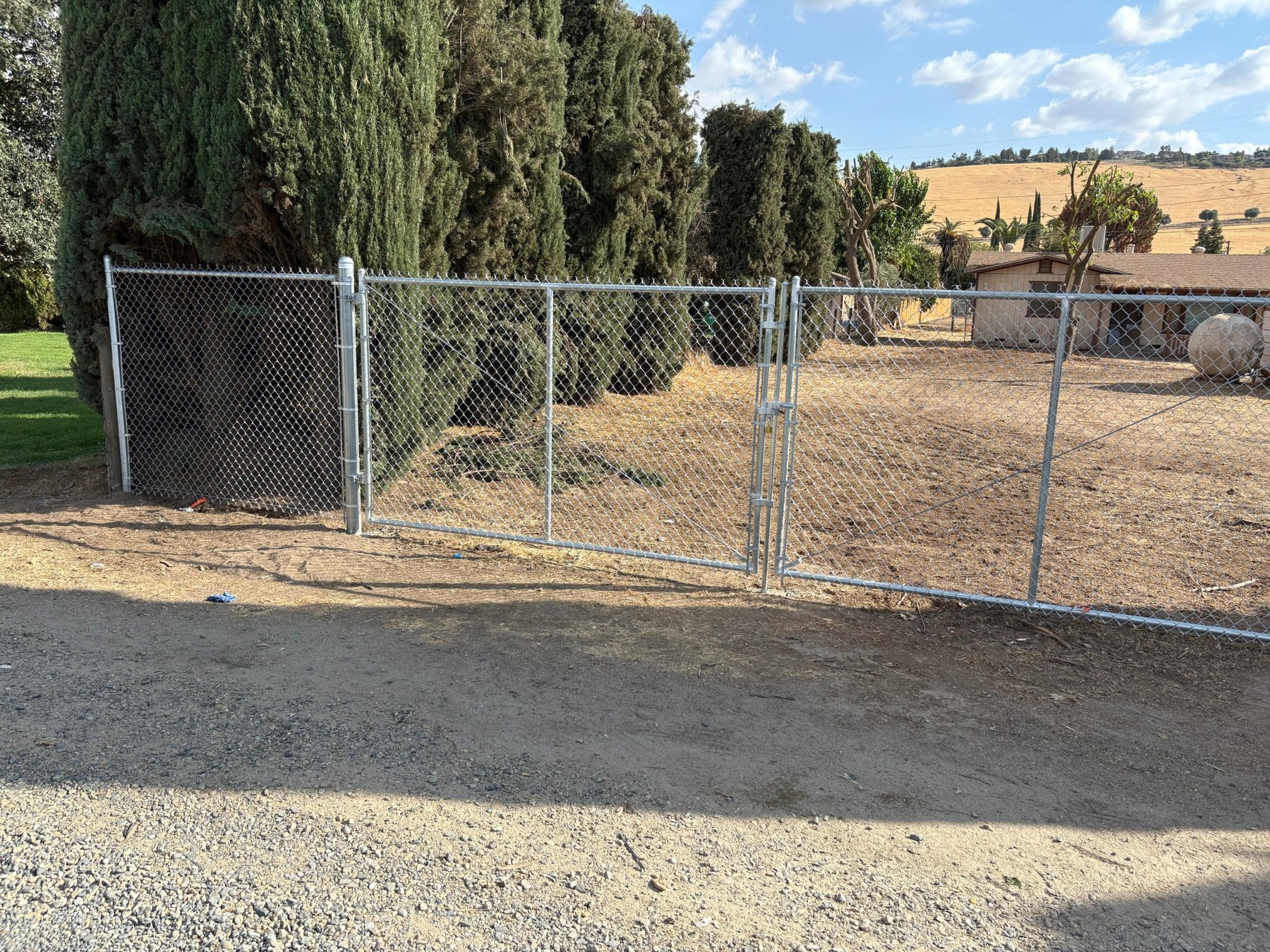 Chain link fence installation in Fowler by AP Fence
