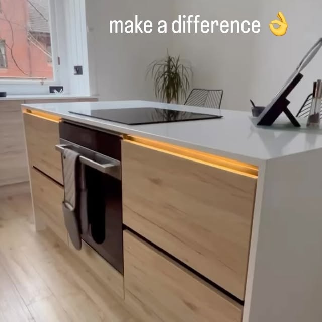 Timber kitchen island and fitted interior detail by Core Joinery and Interiors
