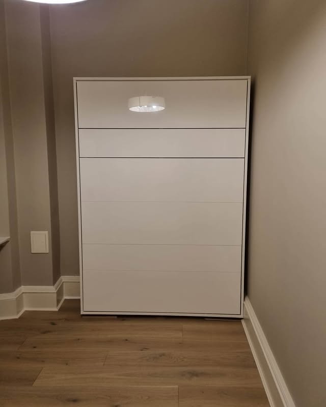 Space-saving fitted Murphy bed installation by Core Joinery and Interiors