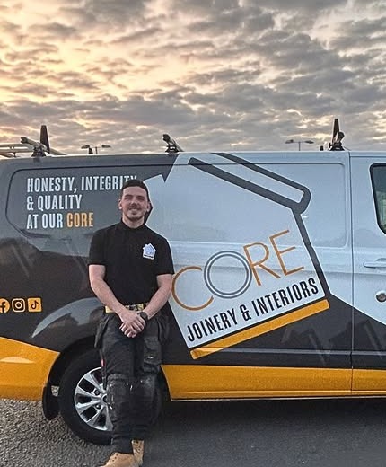 Craig from Core Joinery and Interiors standing beside his branded work van