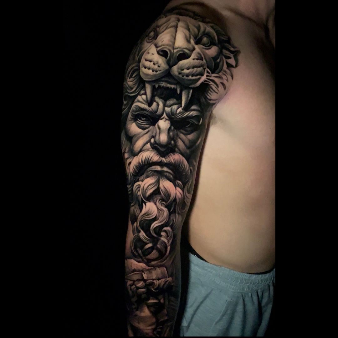 Black and grey tattoo sleeve by 5 Venoms Custom Tattoo