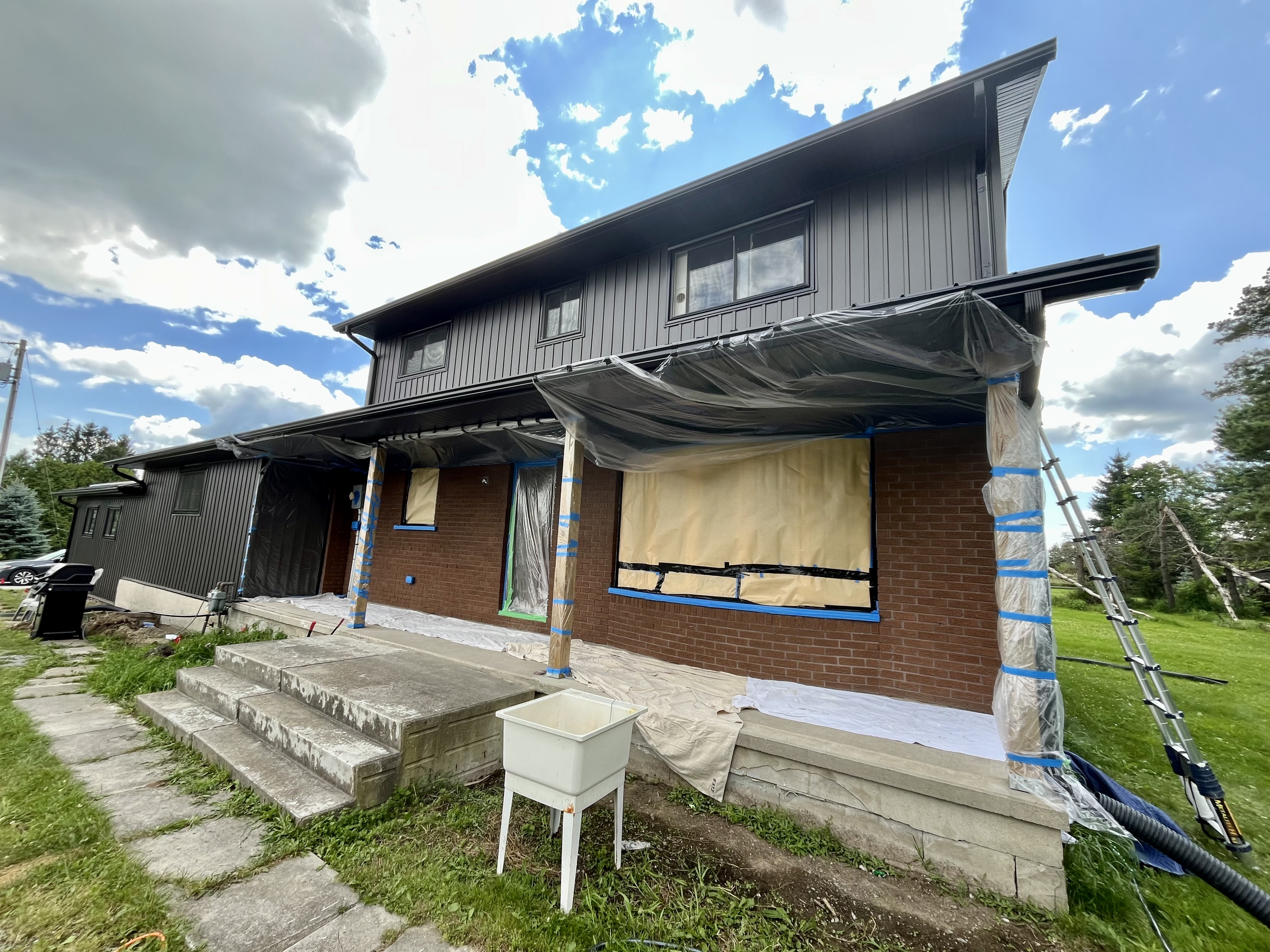 Before dark brick staining project by Altona Painting