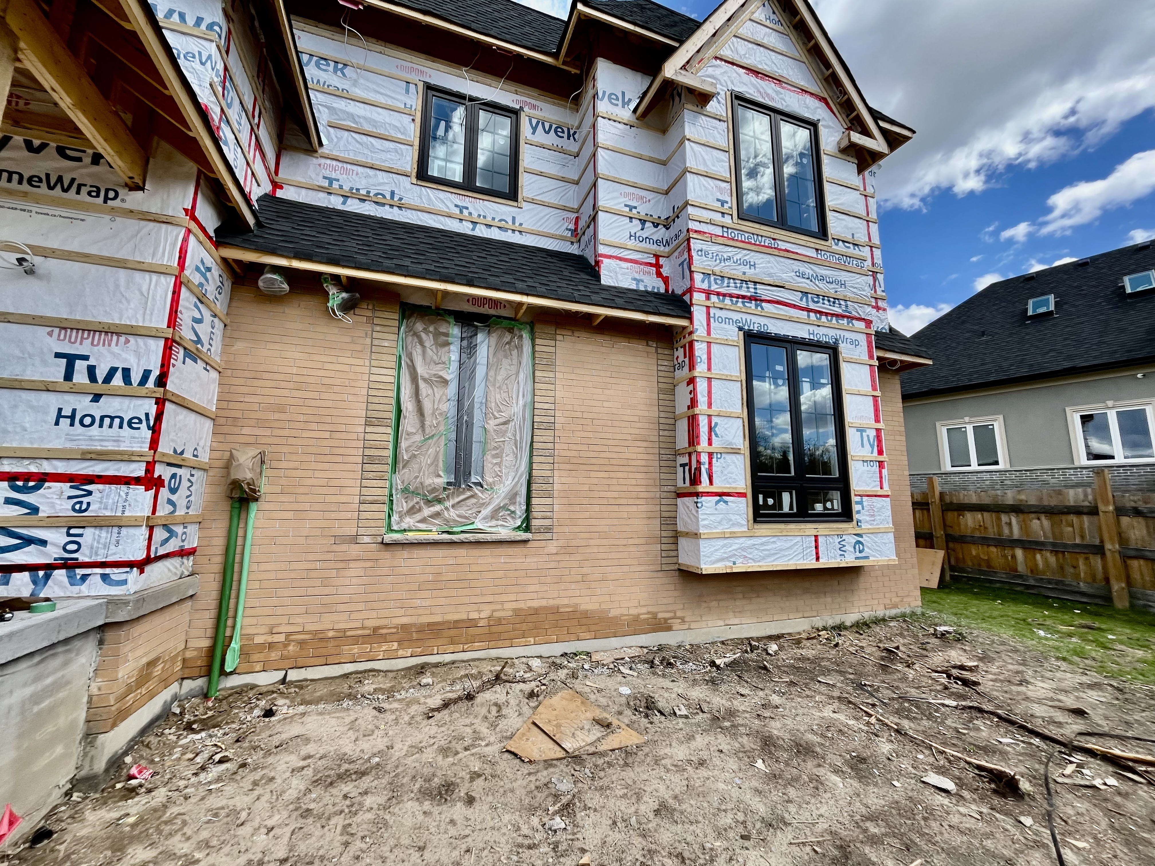 Before yellow brick staining — white stain project by Altona Painting