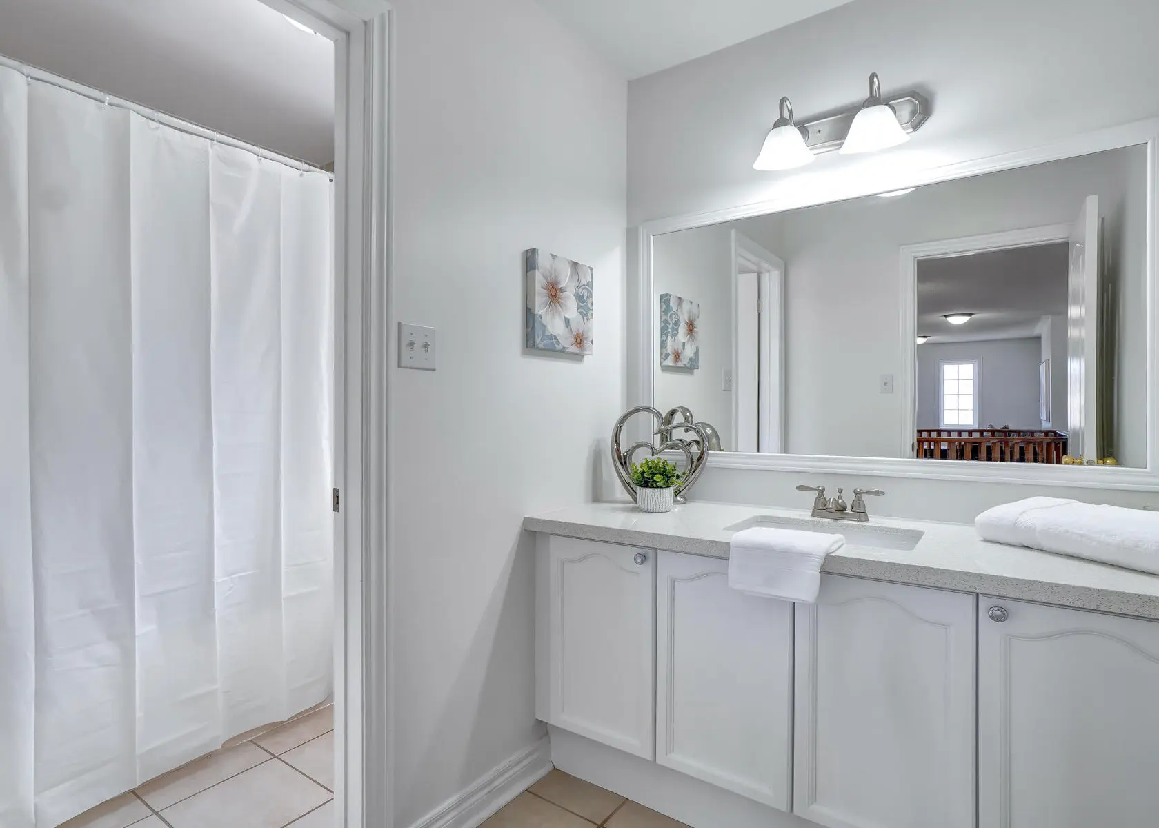 Bathroom after paint colour consultation and painting — clean neutral palette by Altona Painting