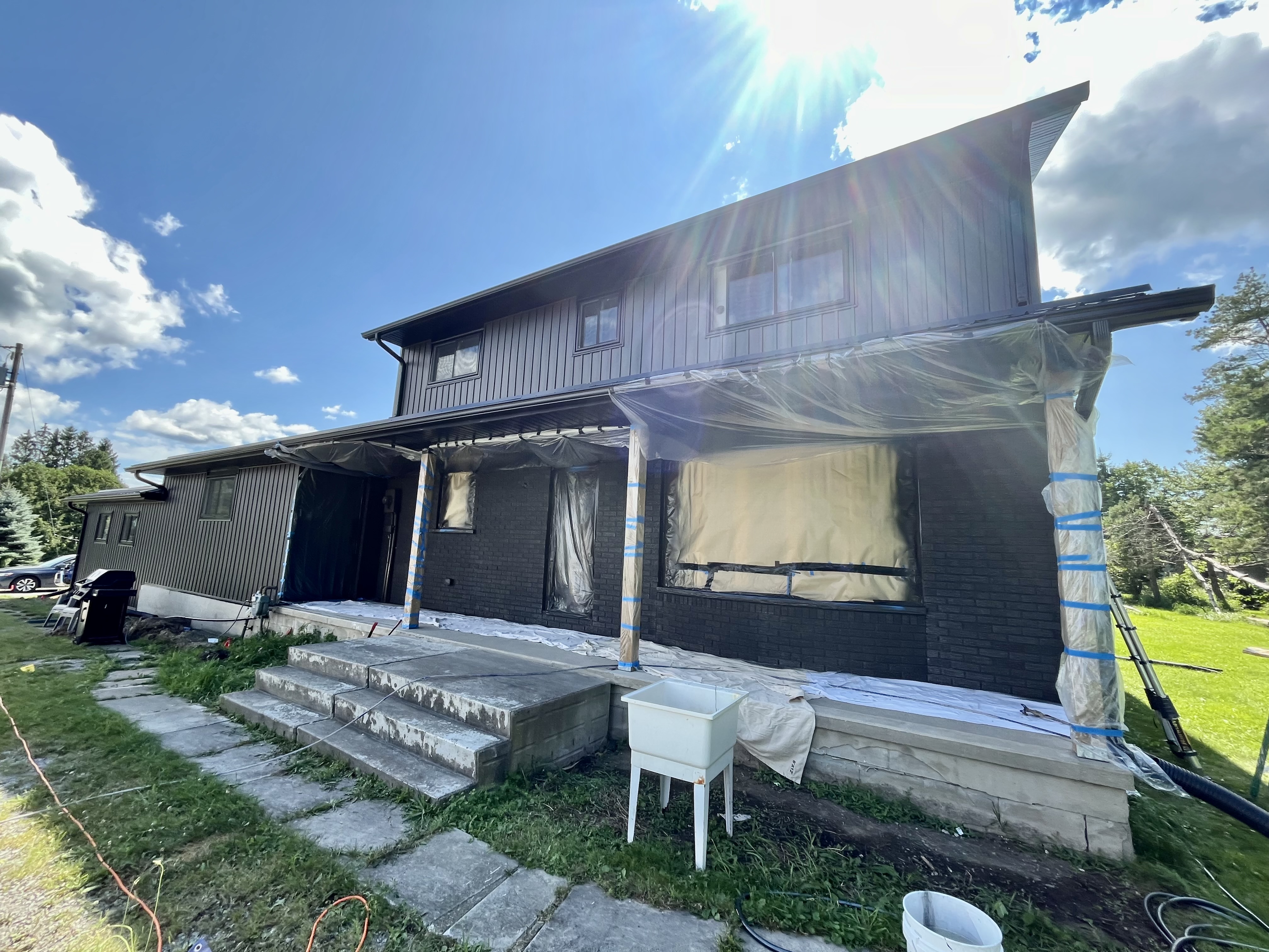 After dark brick staining project by Altona Painting
