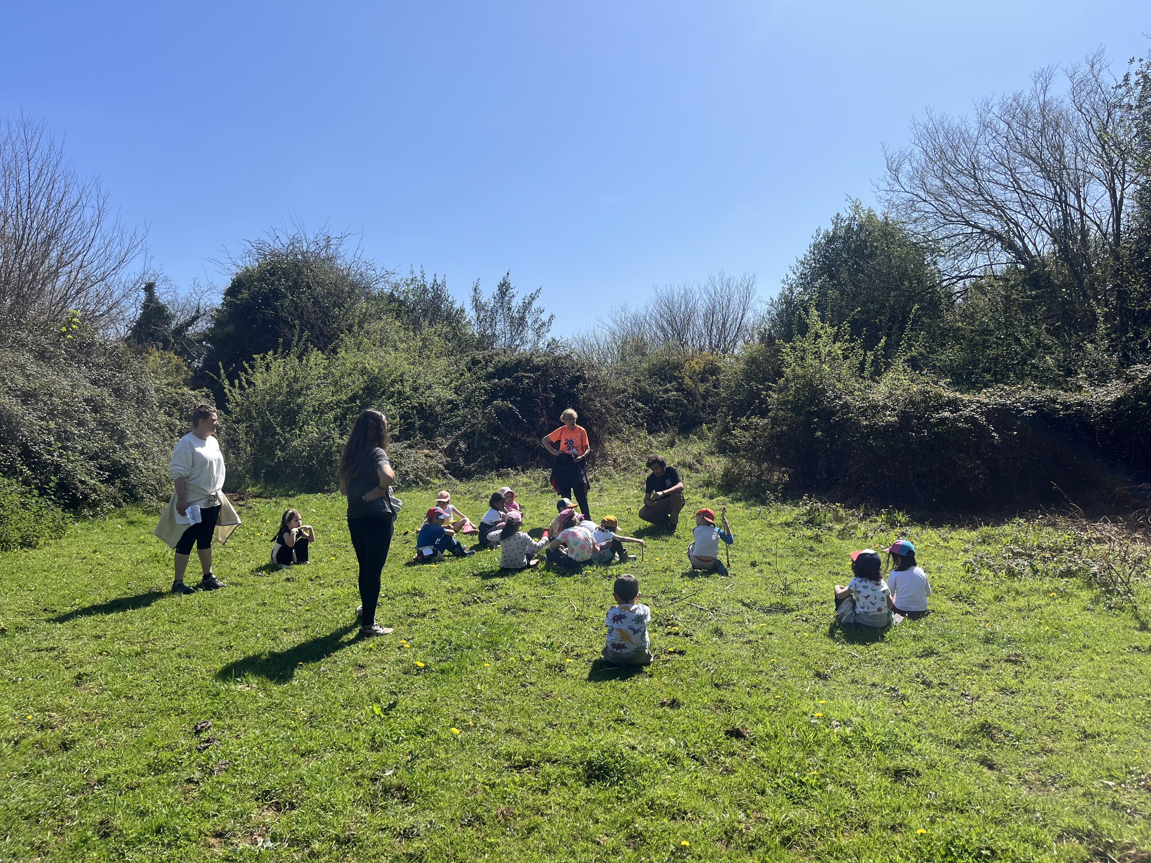 Children sitting at Wild Finca Children sitting at Wild Finca