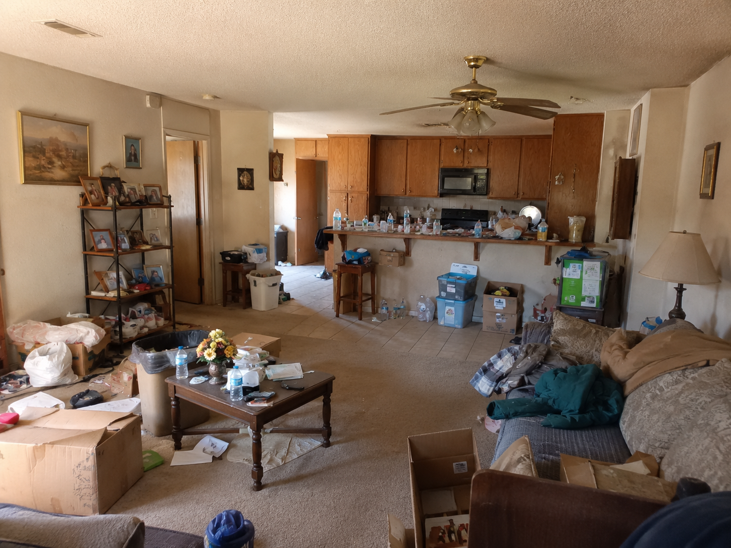 Cluttered house interior — Homeportunity buys as-is