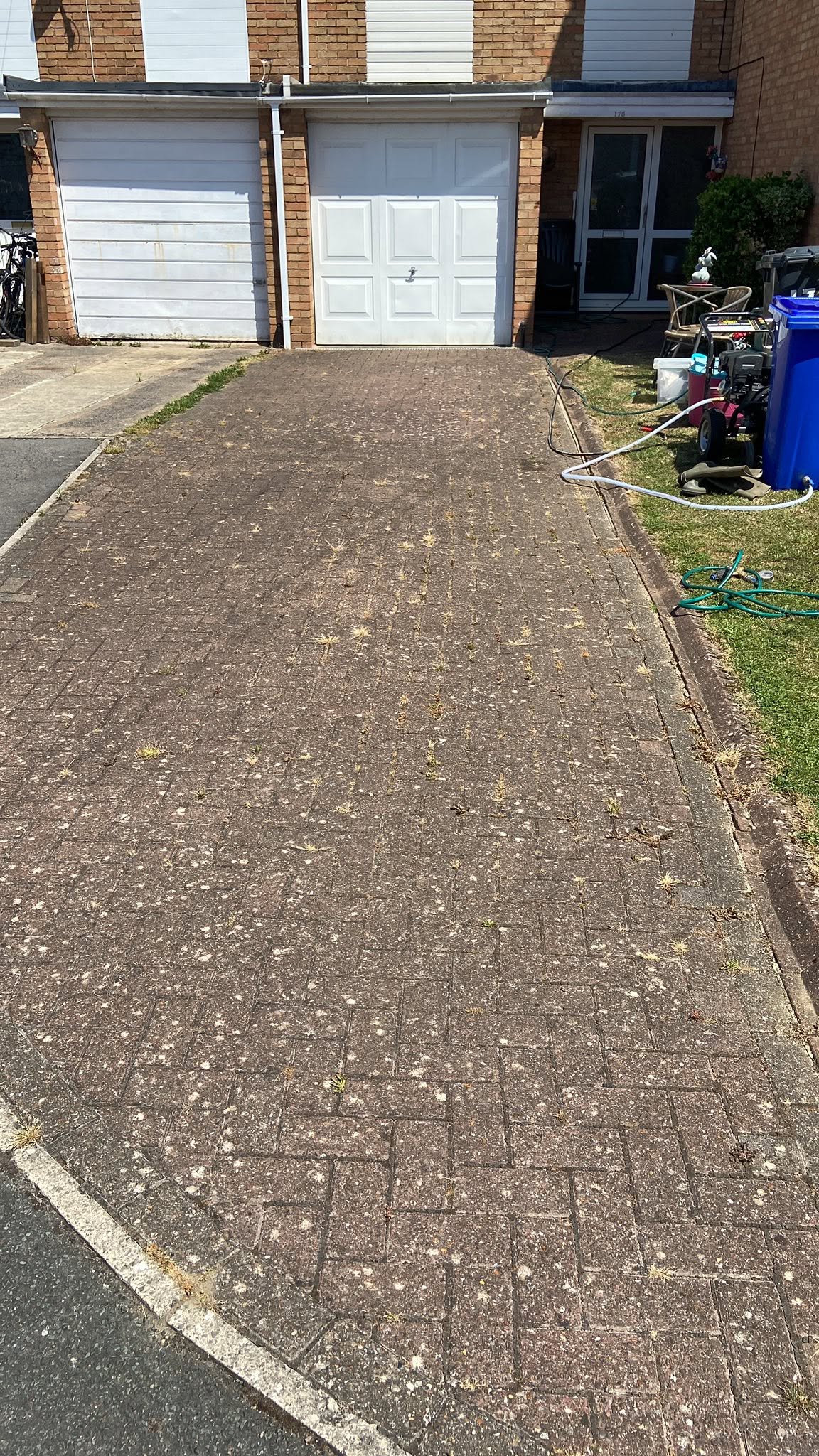 Block paving driveway in Gloucester before pressure washing and re-sanding by Glevum Hydro