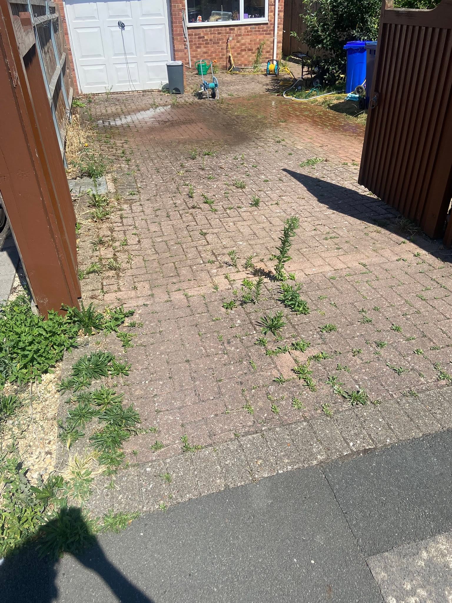 Block paving driveway in Gloucestershire before deep pressure washing by Glevum Hydro