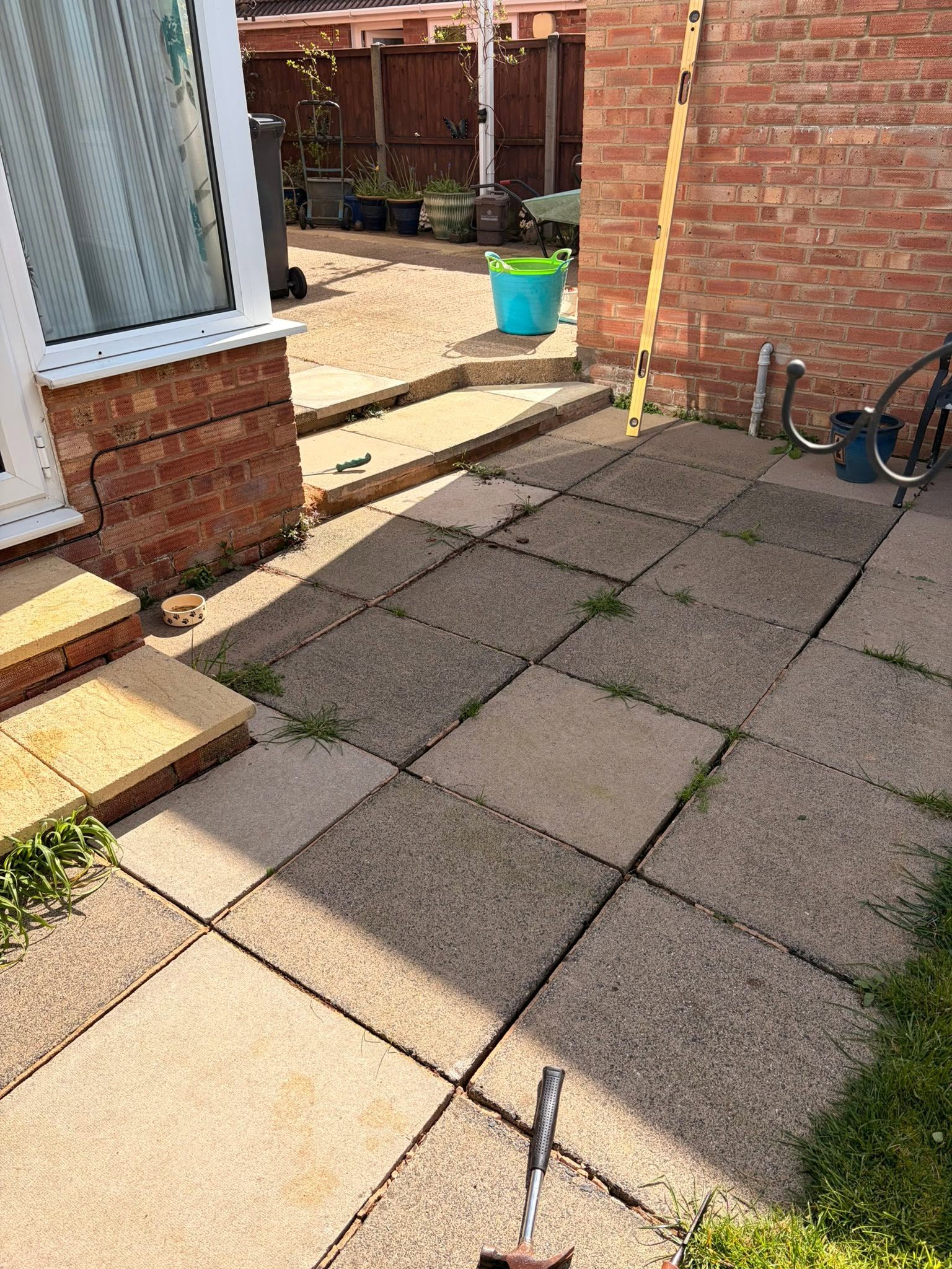 Patio in Gloucester before deep clean, de-weeding and re-grouting by Glevum Hydro