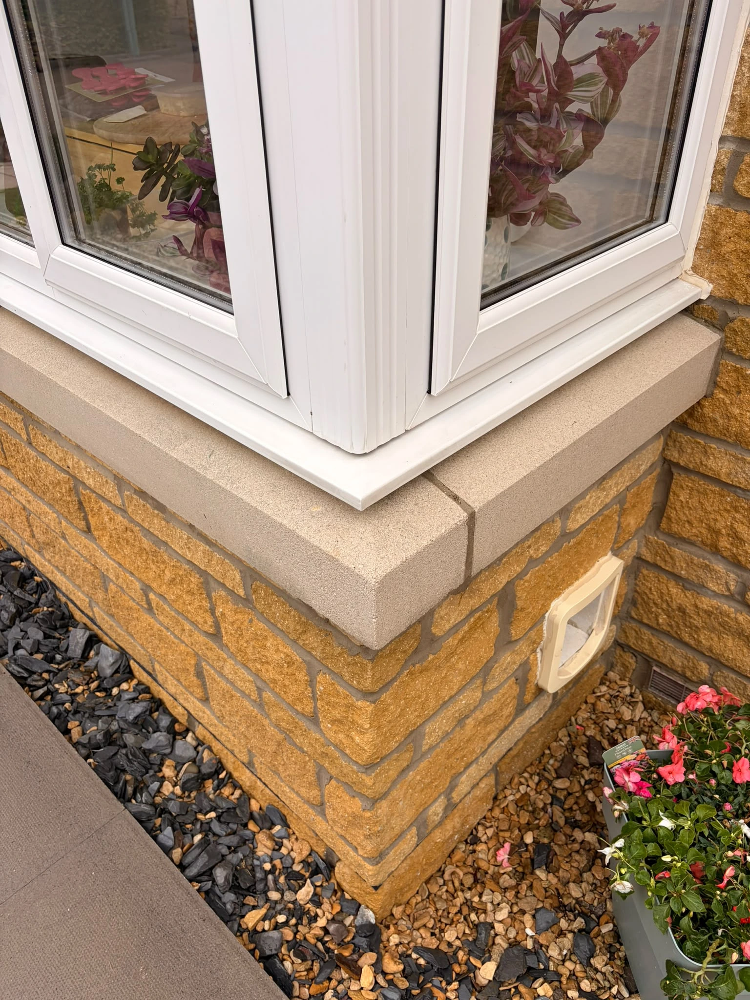 External stone window sill in Gloucester after soft washing removing black staining by Glevum Hydro