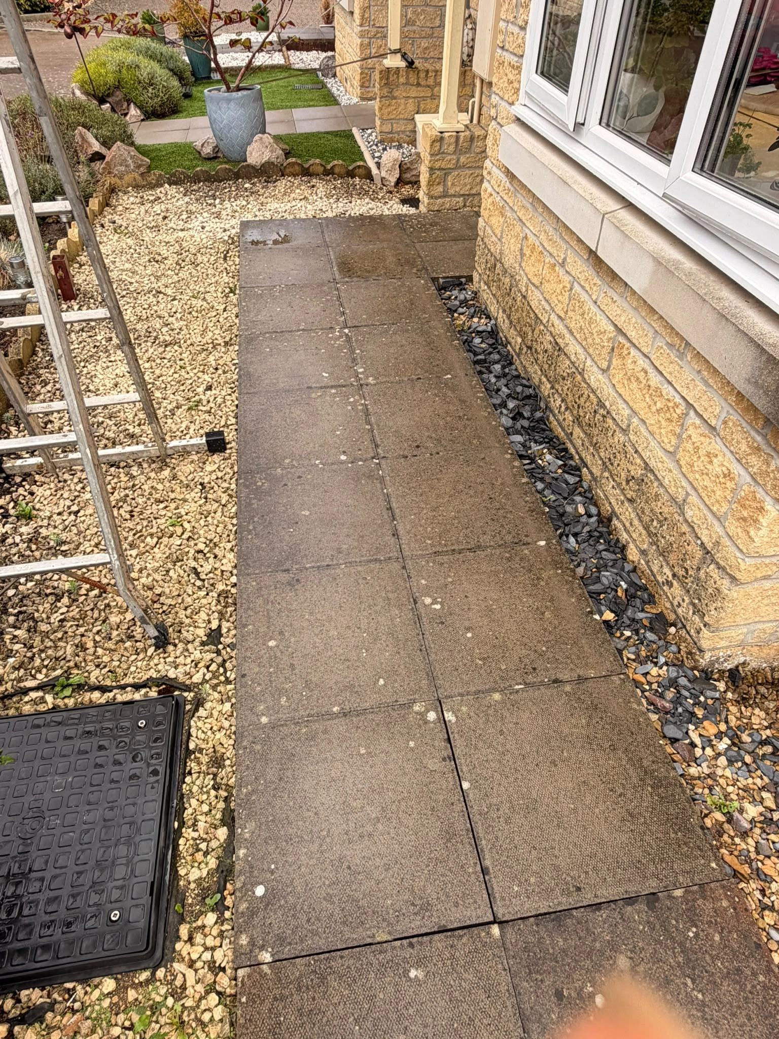 Outdoor patio in Gloucester after soft washing, stonework restored by Glevum Hydro