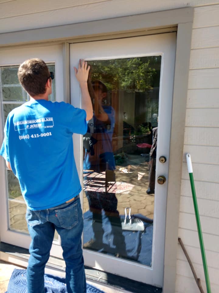 James O'Donnell installing door glass
