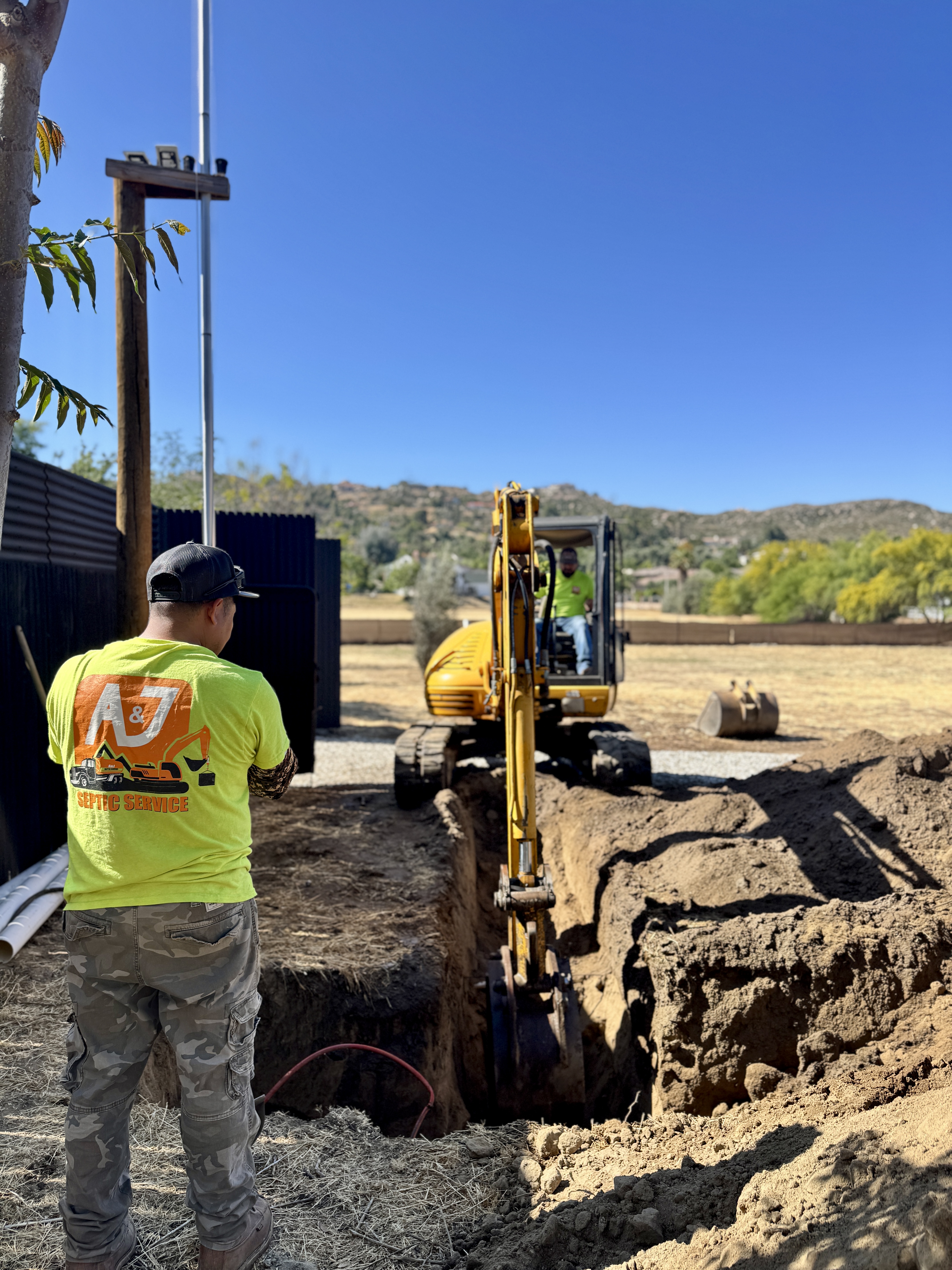 A&J Septic Services team on a job site in Riverside, California