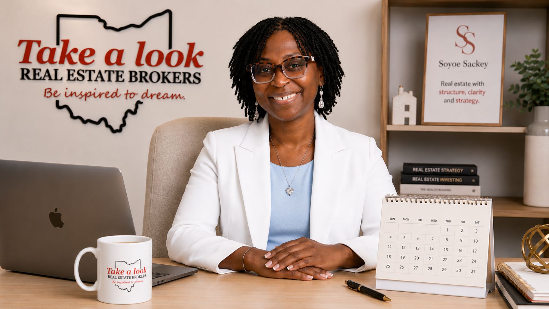Soyoe Sackey at her desk