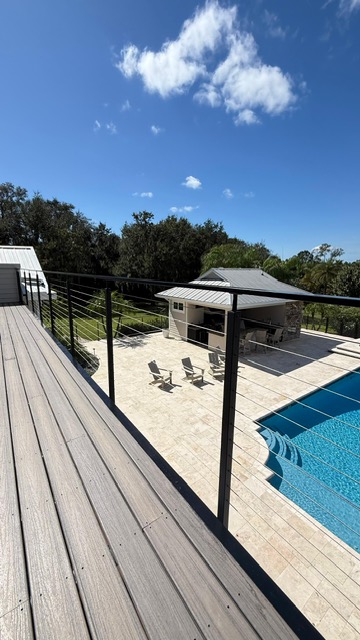 Waterfront terrace railing installed by Railing Max in Florida