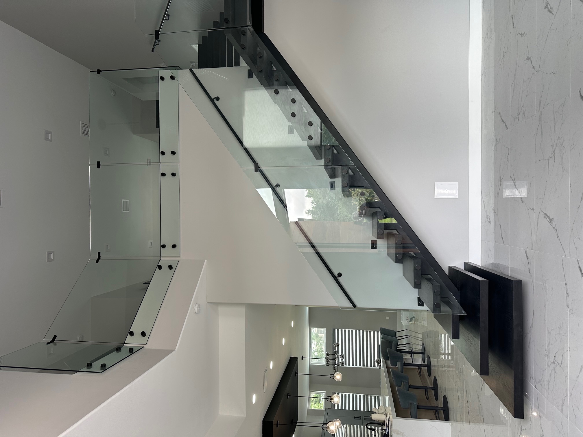 Completed floating staircase installation in a Florida residence by Railing Max
