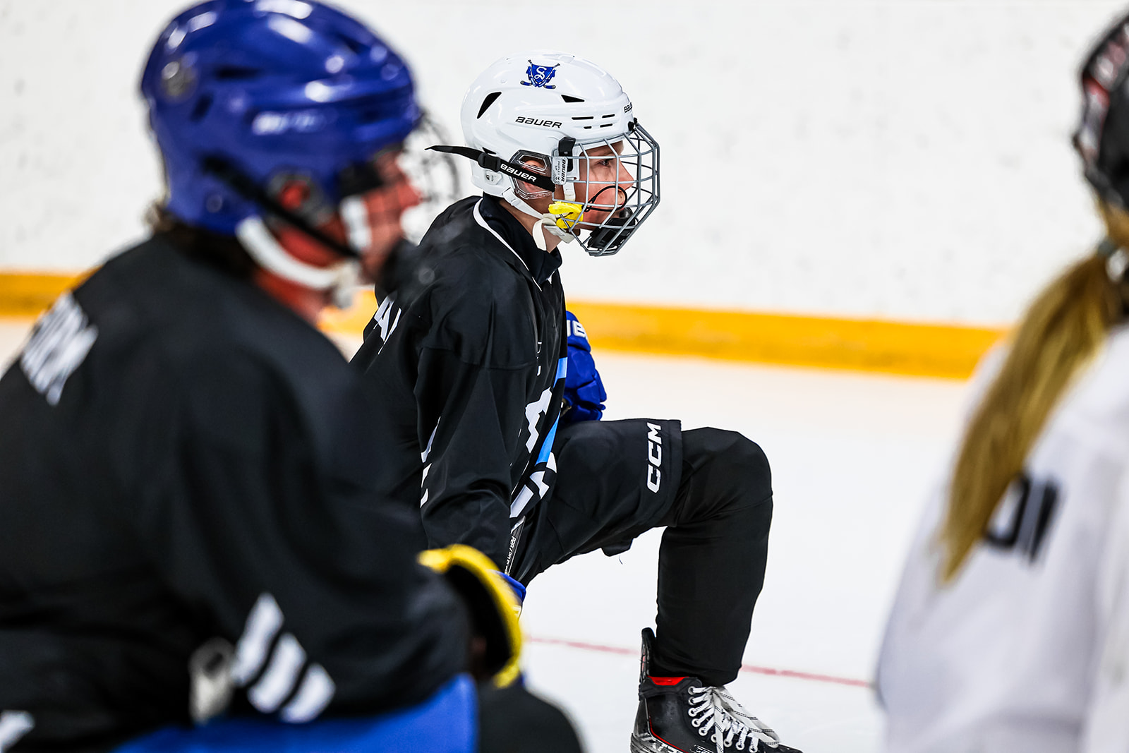 X7 Hockey youth player in action