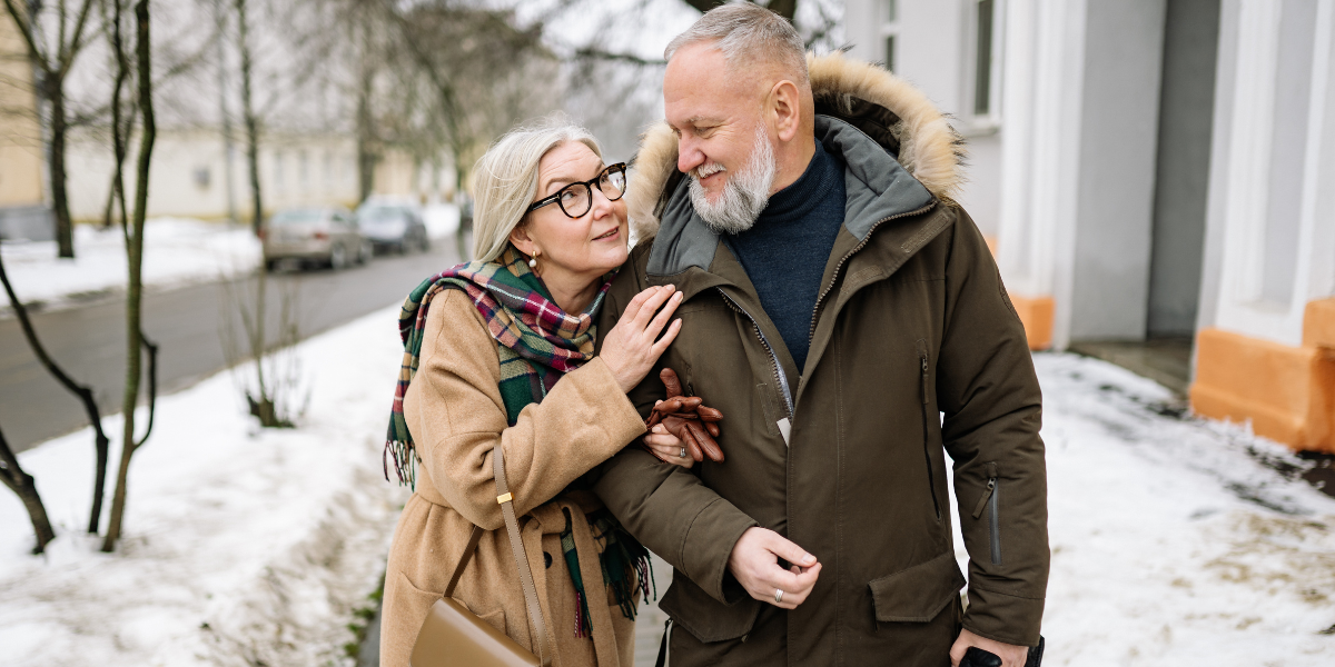 A man and woman over 50 looking into each others eyes affirming their love A man and woman over 50 looking into each others eyes affirming their love
