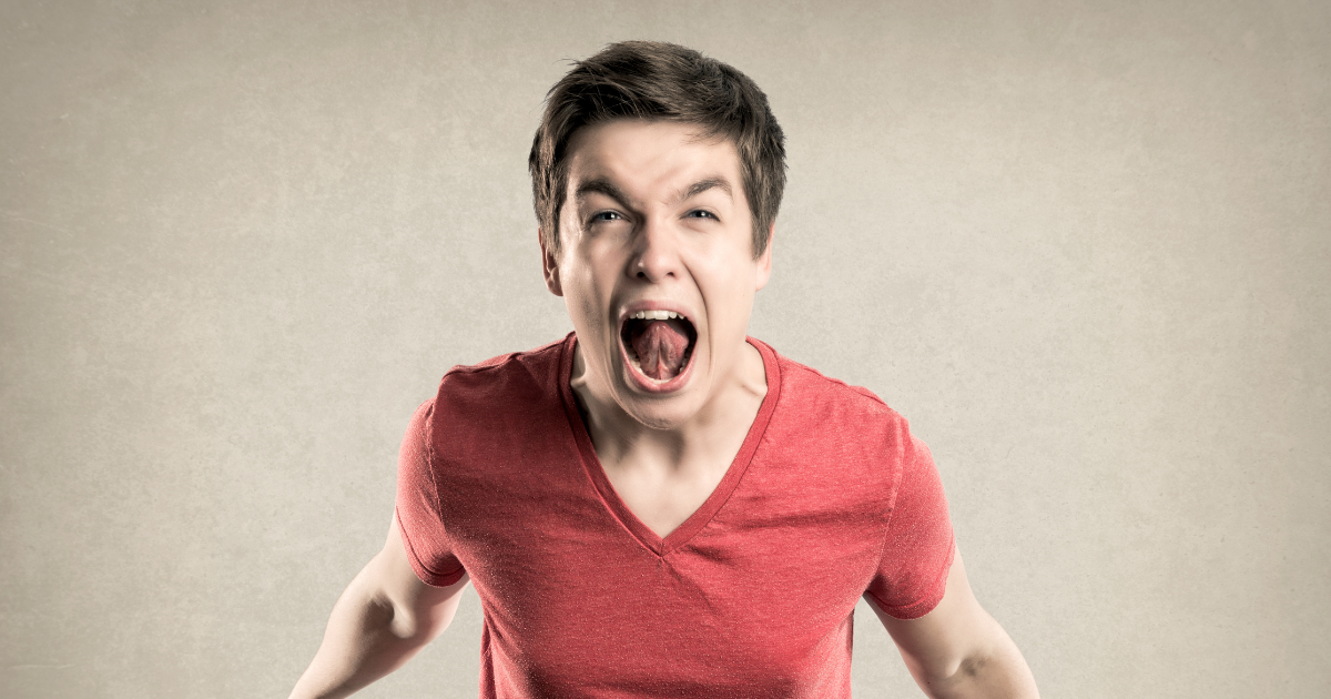 Teenager experiencing an emotional outburst, showing how behaviour can be the visible result of many unseen pressures building beneath the surface. Teenager experiencing an emotional outburst, showing how behaviour can be the visible result of many unseen pressures building beneath the surface.