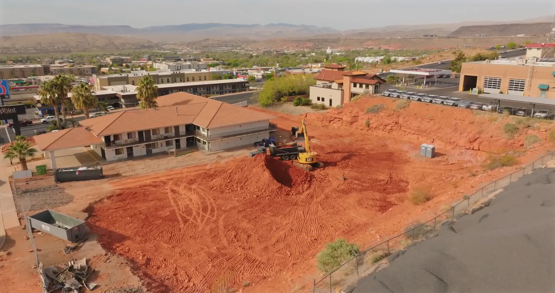 Overview of east side St. George Boulevard with construction and new businesses